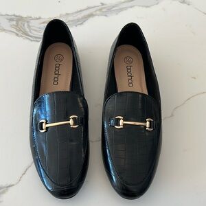 Black croc loafers with gold detail